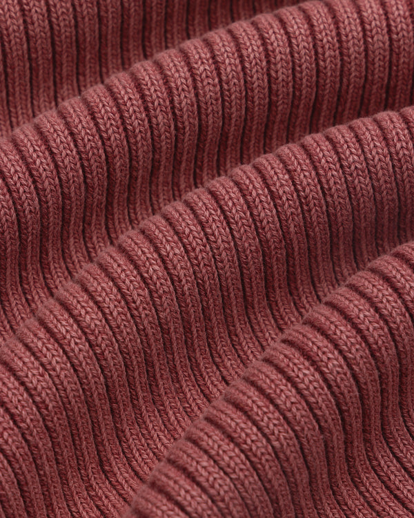 Close-up of textured, ribbed fabric with soft folds on the Stone Washed Knit Tank Top.