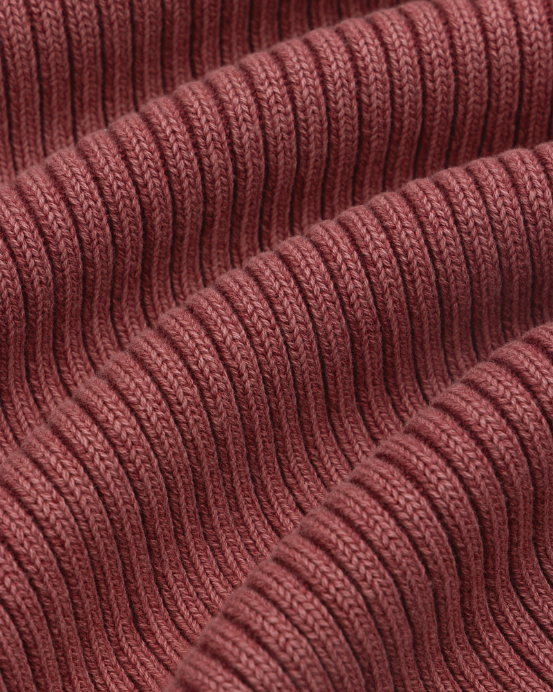 Close-up of textured, ribbed fabric with soft folds on the Stone Washed Knit Tank Top.