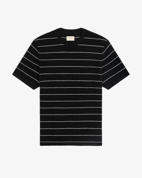 Merino Wool Eyelet Tee in black with thin white horizontal stripes, short sleeves, displayed flat on white background.