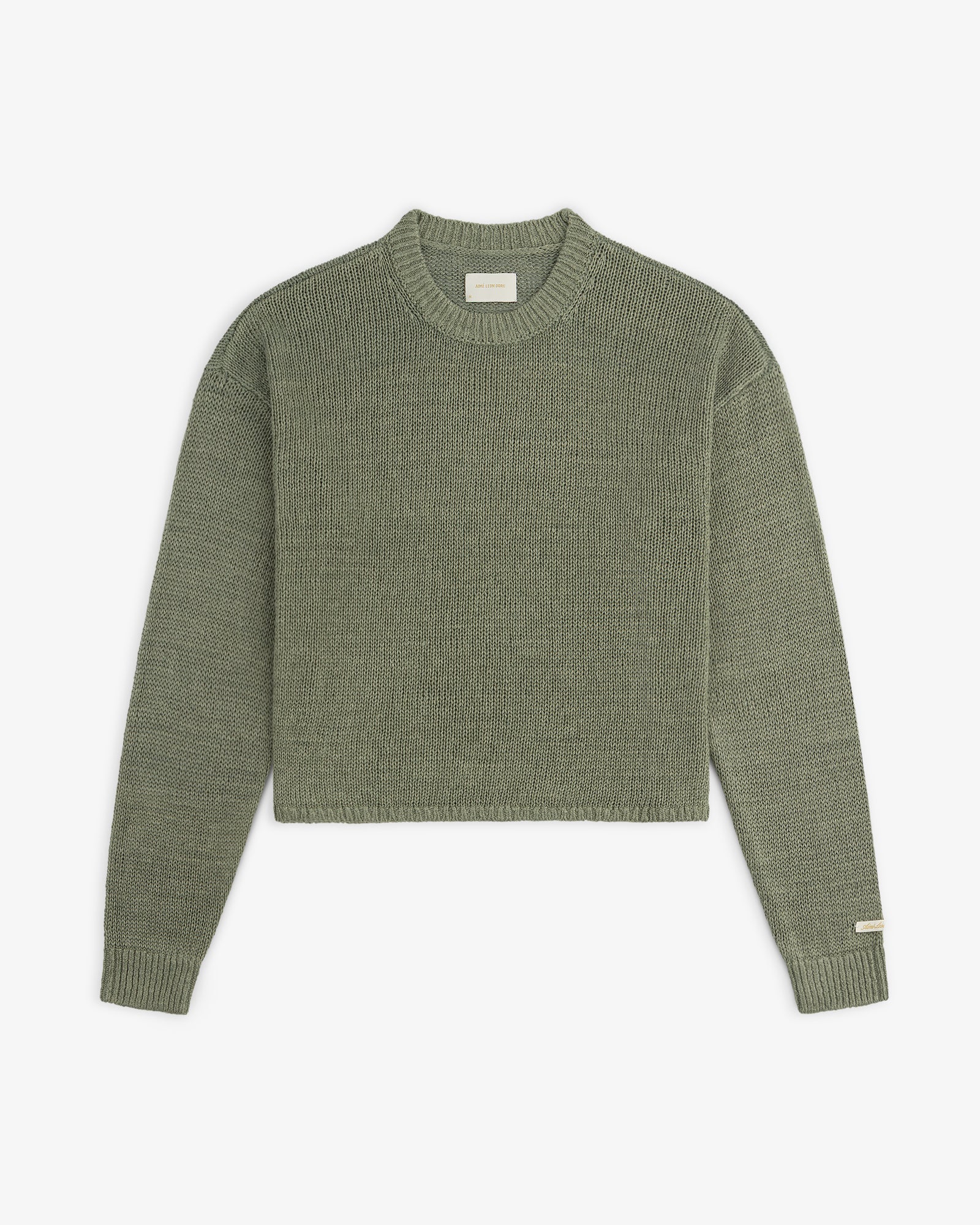 Linen Knit Crewneck Sweater in olive green with long sleeves and ribbed cuffs, shown flat on a white background.