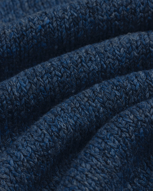 Close-up of textured blue Linen Knit Drawstring Short showing visible rows of stitches and soft folds.