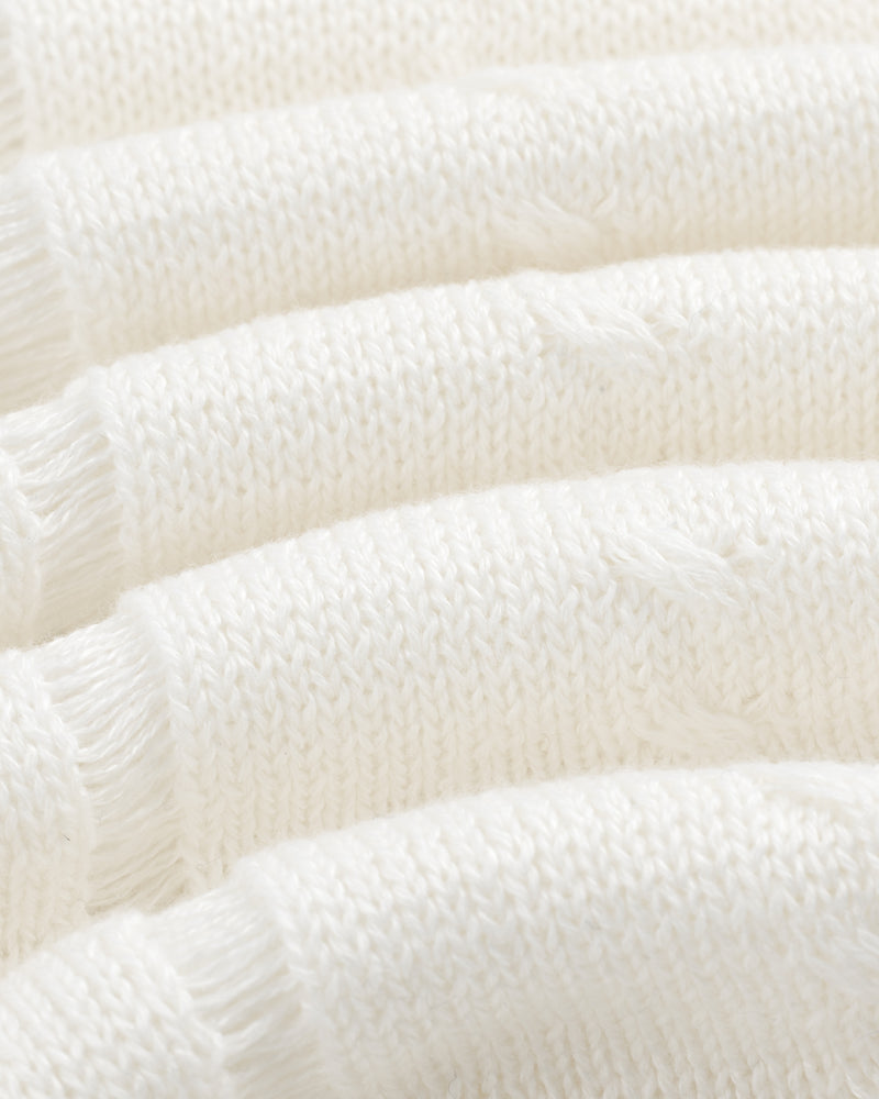 Close-up of Pointelle Tank Top's soft white knit fabric with horizontal textured ridges and loose threads.