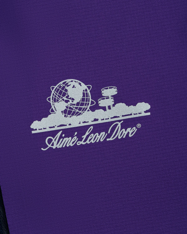 White Aimé Leon Dore globe and trees logo printed on purple Lightweight GORE-TEX Shell Jacket.