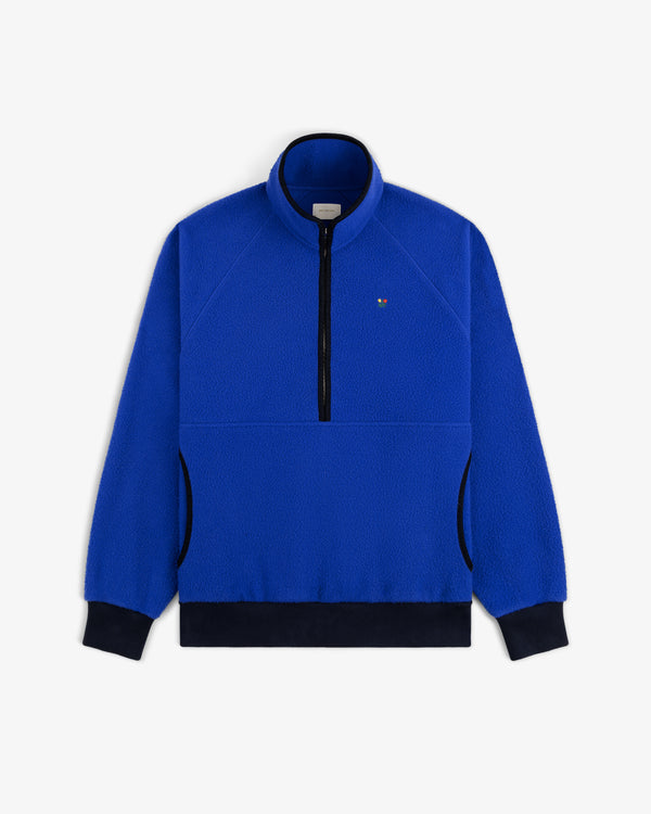Casentino Crest Half-Zip Pullover: Blue fleece with black cuffs, hem, zipper, and small chest embroidered logo.