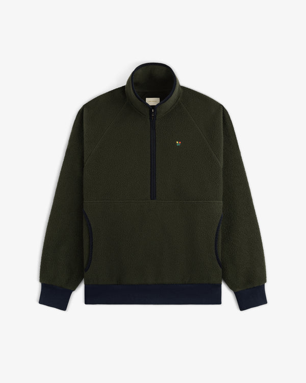 Casentino Crest Half-Zip Pullover: dark green fleece with navy cuffs/hem and a small left-chest embroidered logo.