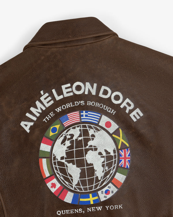 World's Borough Leather Flight Jacket with AIMÉ LEON DORE, globe and flags, text: QUEENS, NEW YORK.