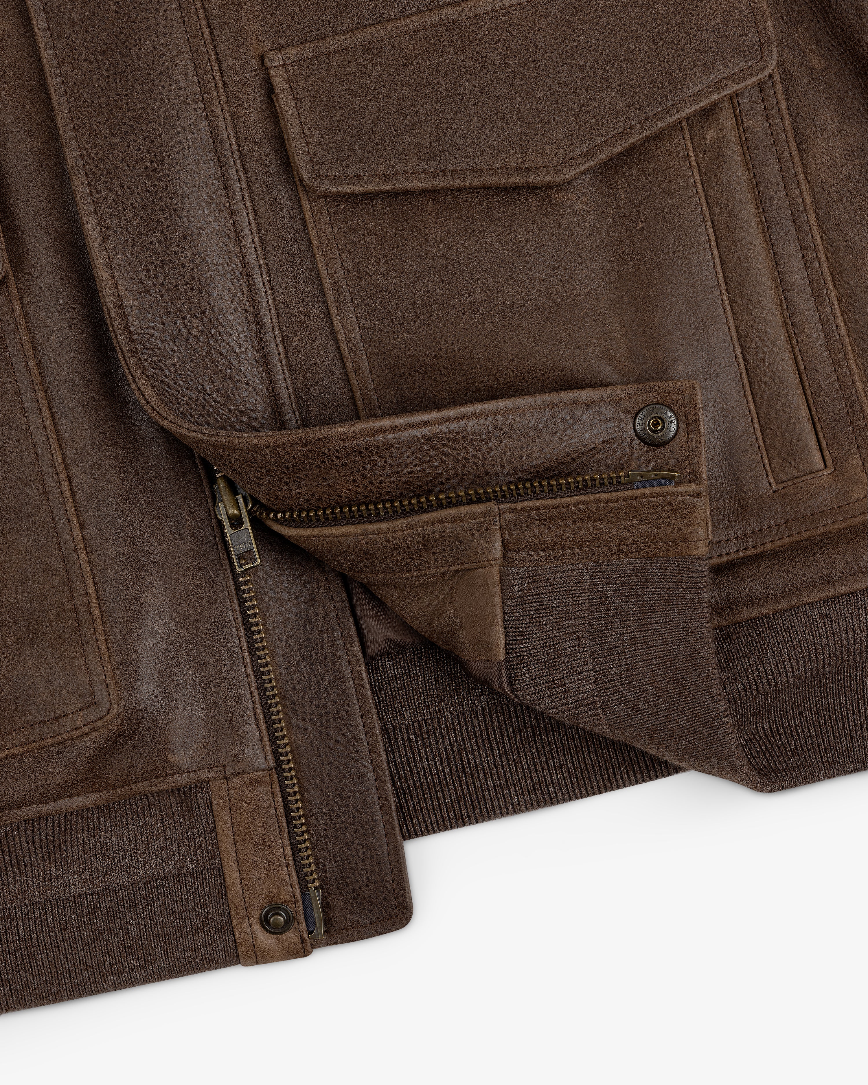 Close-up of the World's Borough Leather Flight Jacket with zippered opening and pocket details.