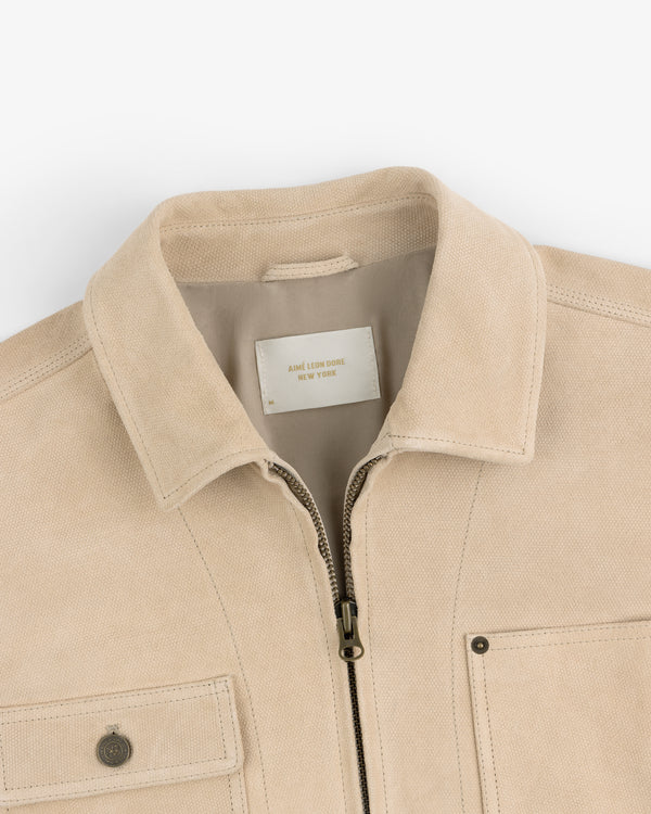 Beige Leather Ranch Jacket with zipper, buttoned chest pocket, and inside label reading JAMES LEON DORE NEW YORK.