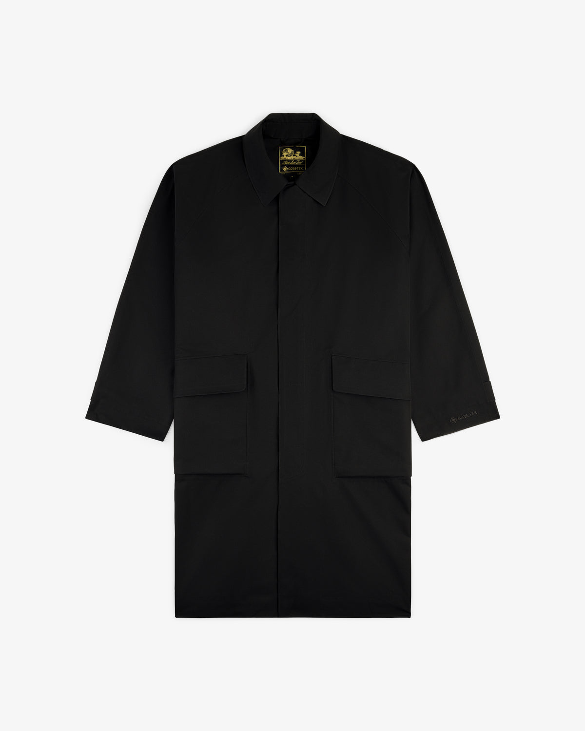 GORE-TEX Balmacaan Coat with a collar and two large front flap pockets, shown on a white background.