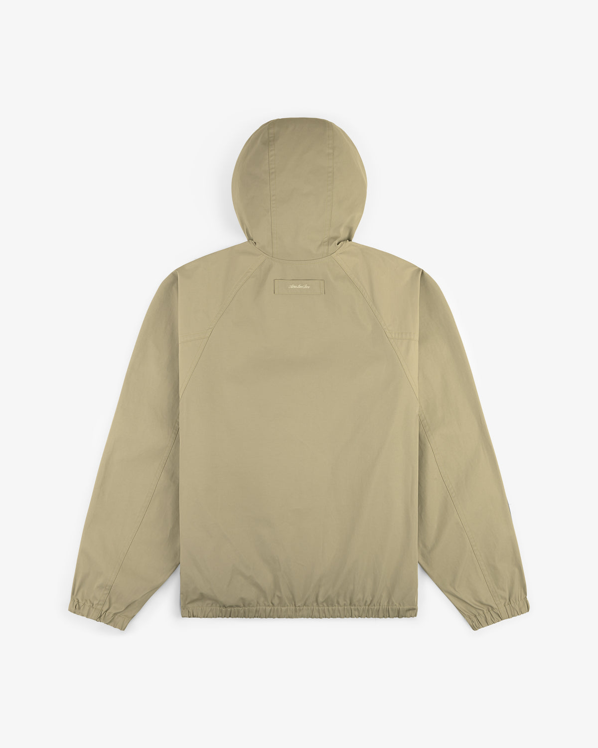 Reversible Madras Windbreaker in beige, shown from the back with elastic cuffs and hem on a white background.