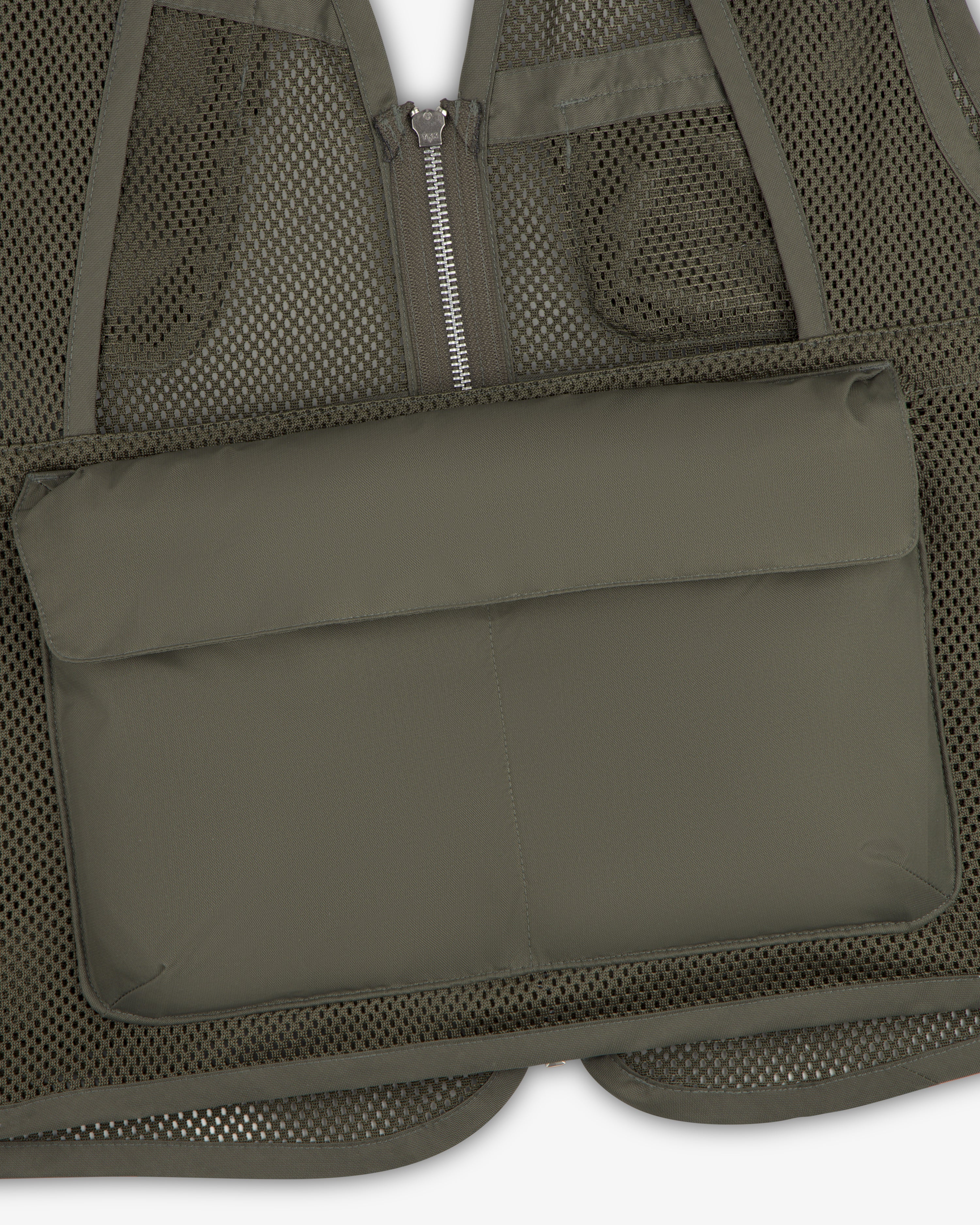 Close-up of the Nylon Utility Vest featuring a large rectangular padded front pocket.