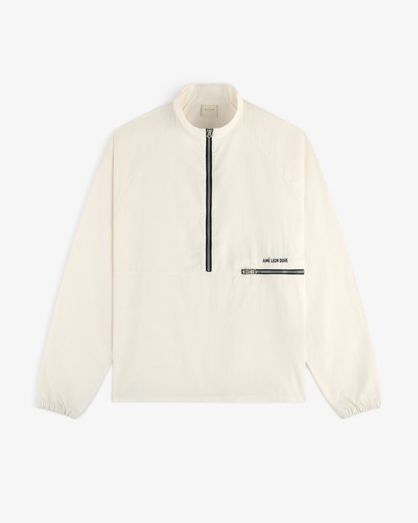 Off-white long-sleeve Nylon Packable Windbreaker with half-zip, black chest pocket, and ARE LOS DOIT print near pocket.