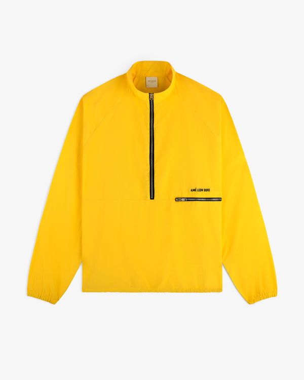 Nylon Packable Windbreaker in bright yellow with long sleeves, front zipper, and zippered chest pocket.