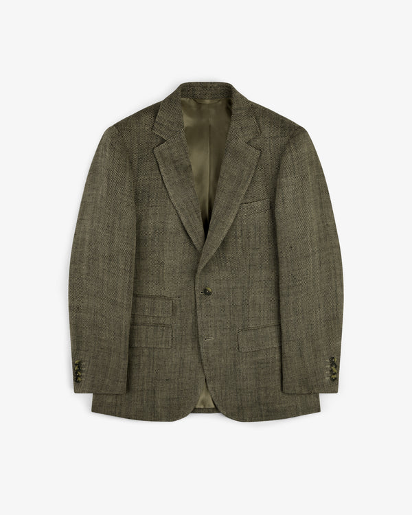 Single-Breasted Yarn Dyed Linen Suit Jacket in olive green with notch lapels, flap pockets, and buttoned cuffs.