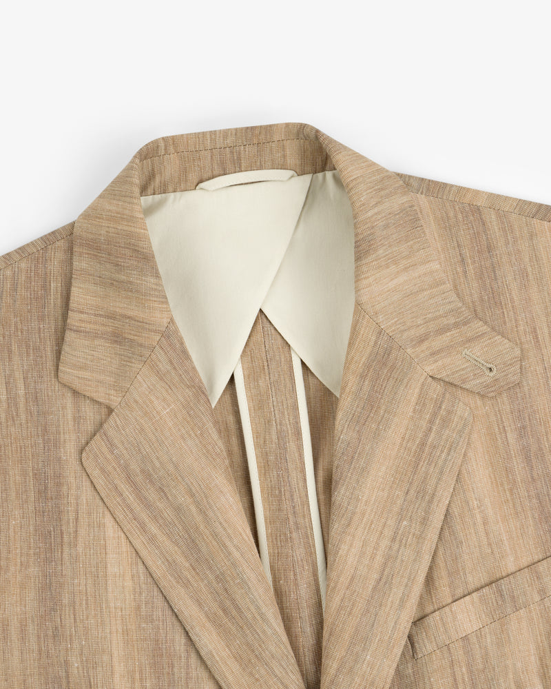 Light brown Single-Breasted Safari Suit Jacket with wide lapel over a cream dress shirt, shown from the shoulders up.