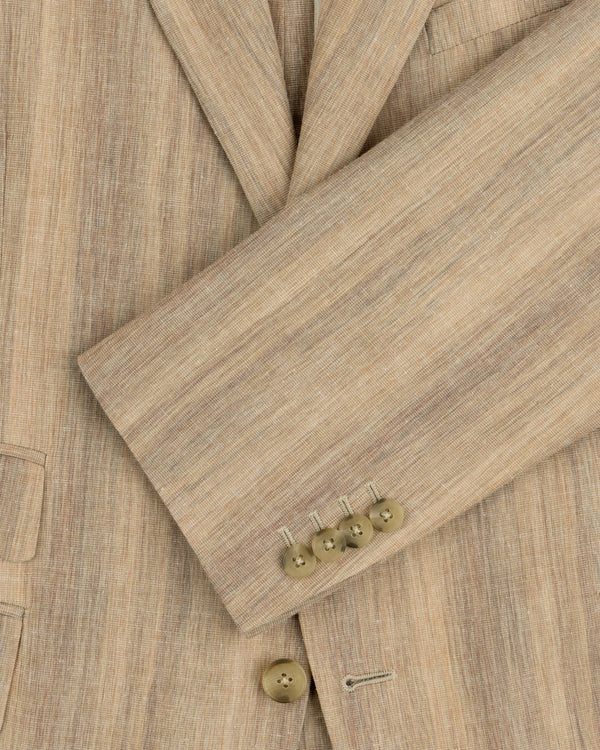 Close-up of a Single-Breasted Safari Suit Jacket sleeve in beige with four brown buttons and part of the pocket visible.