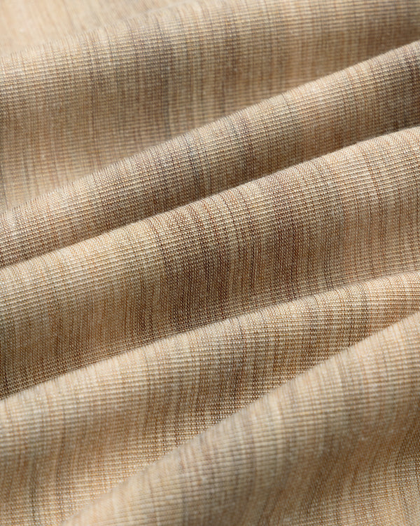 Close-up of beige textured fabric with fine lines and soft folds on a Single-Breasted Safari Suit Jacket.