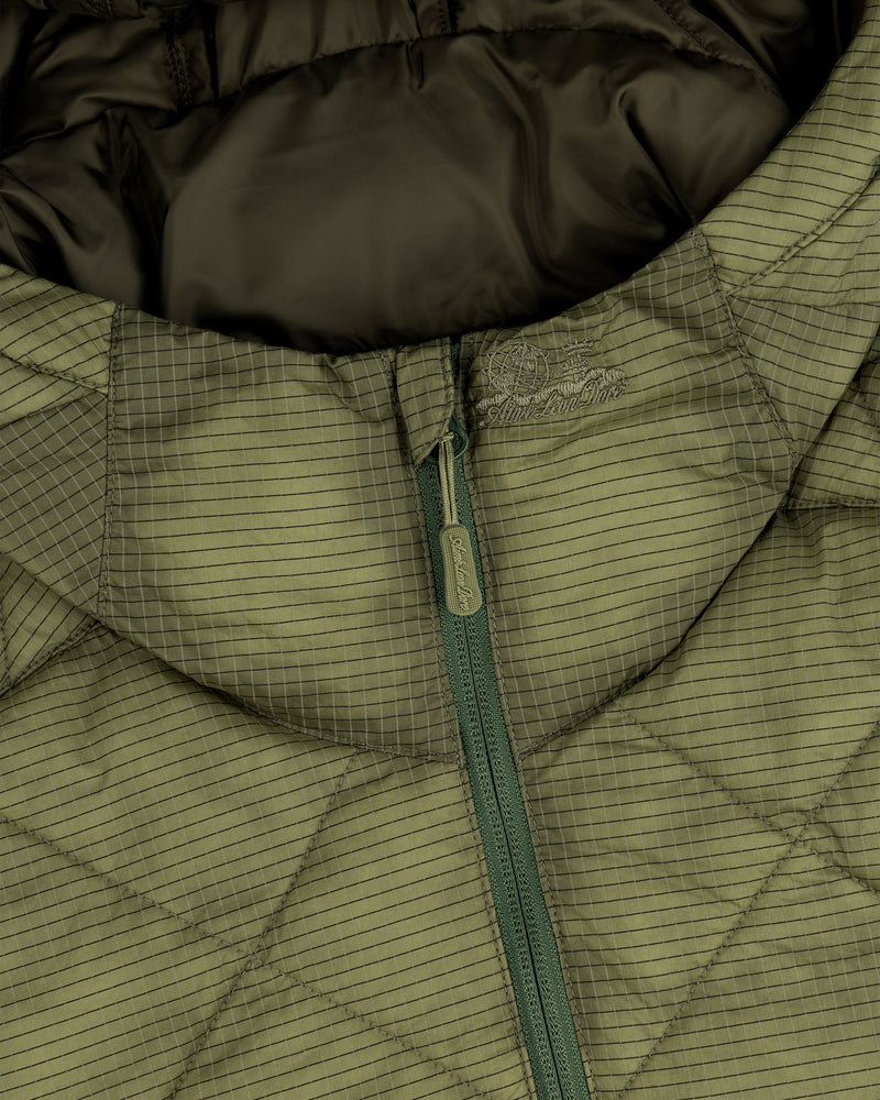 Close-up of the Nylon Quilted Unisphere Jacket in olive green, featuring a zip front and grid pattern.