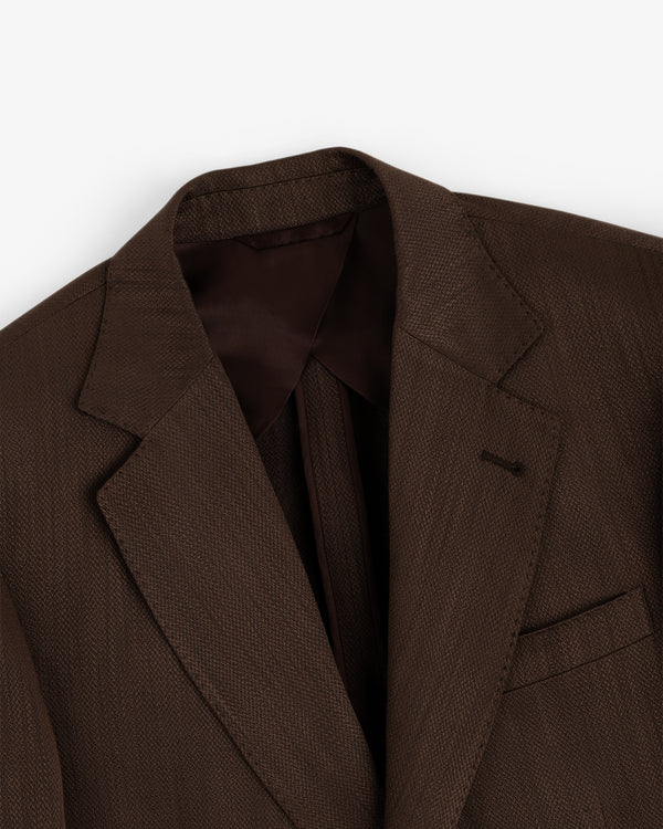 Single-Breasted Linen Blend Suit Jacket in brown with notched lapels, chest pocket, and dark brown lining on white background.