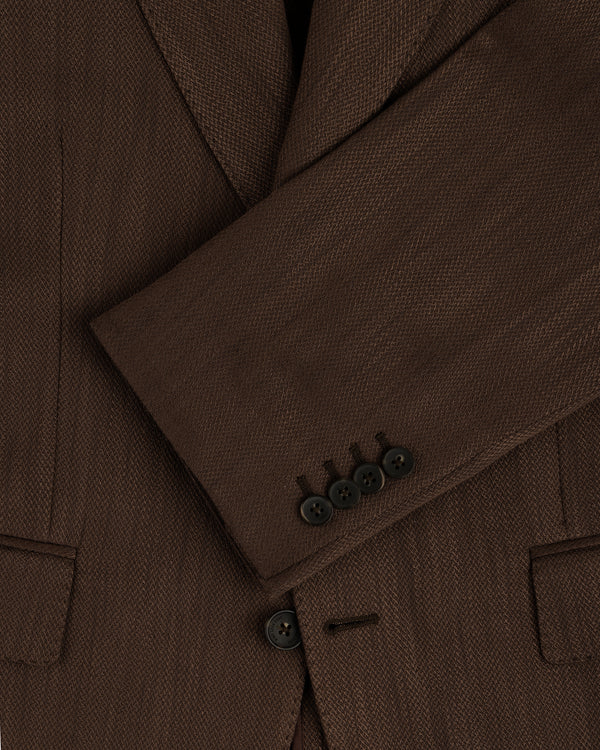 Close-up of a Single-Breasted Linen Blend Suit Jacket sleeve, featuring four black buttons and a visible pocket.