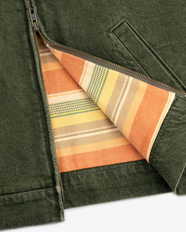 Denim Zip Jacket partially unzipped, showing a striped lining in yellow, orange, and green tones.