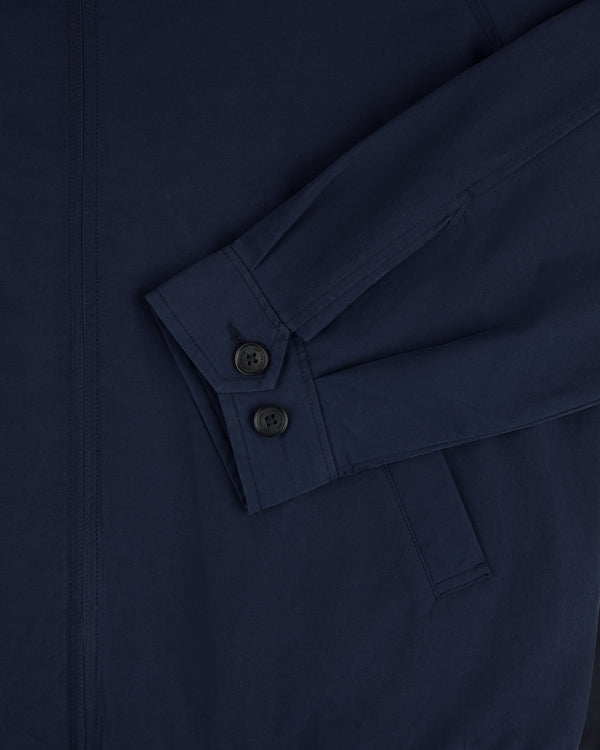 Close-up of Crest Casual Jacket in navy blue, showing sleeve with two black buttons and a visible pocket.