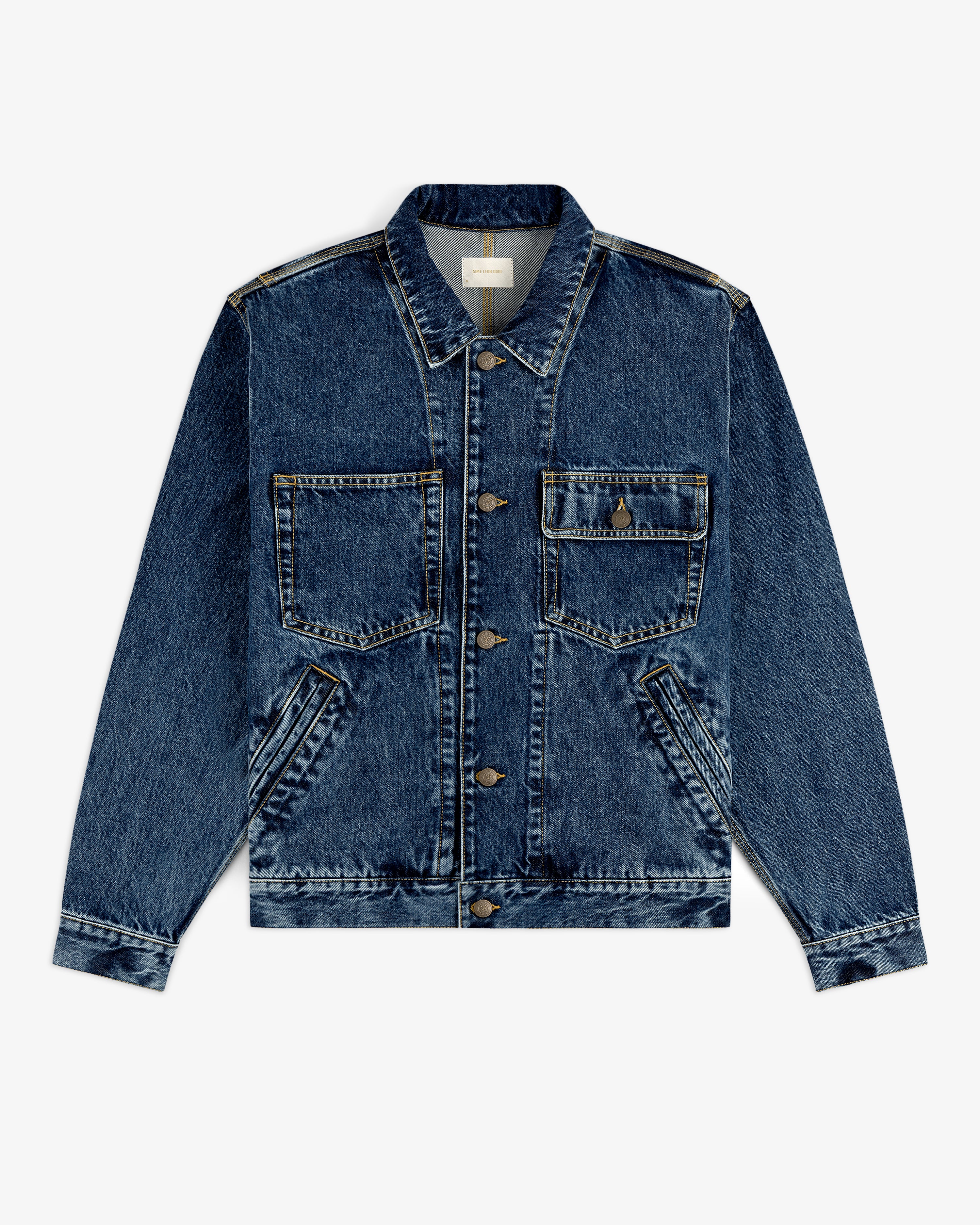 Denim Trucker Jacket with button-up front, two chest pockets, and angled side pockets laid flat on white.