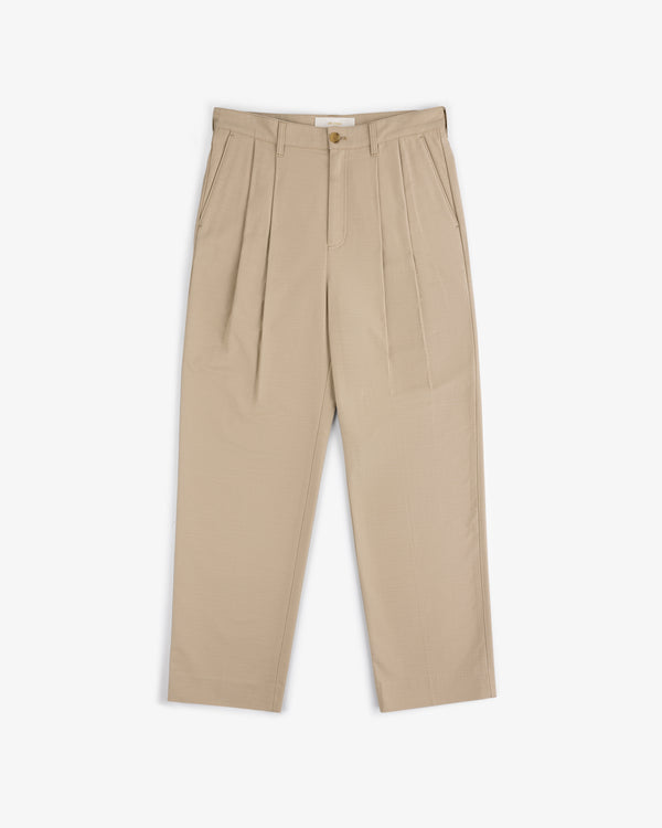 Double Pleated Pant in beige with button and zip closure, front pockets, and straight legs on a white background.