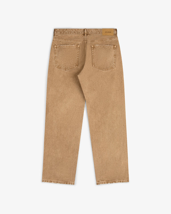 Back view of Relaxed Fit 5-Pocket Denim Pant in tan with two rear pockets and a waistband leather patch.