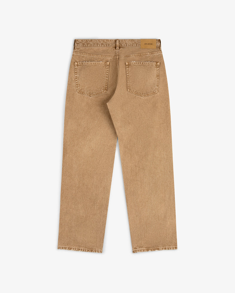 Back view of Relaxed Fit 5-Pocket Denim Pant in tan with two rear pockets and a waistband leather patch.