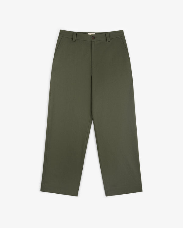 Officer Pant in olive green with wide legs, button-zip closure, belt loops, and side pockets on a white background.