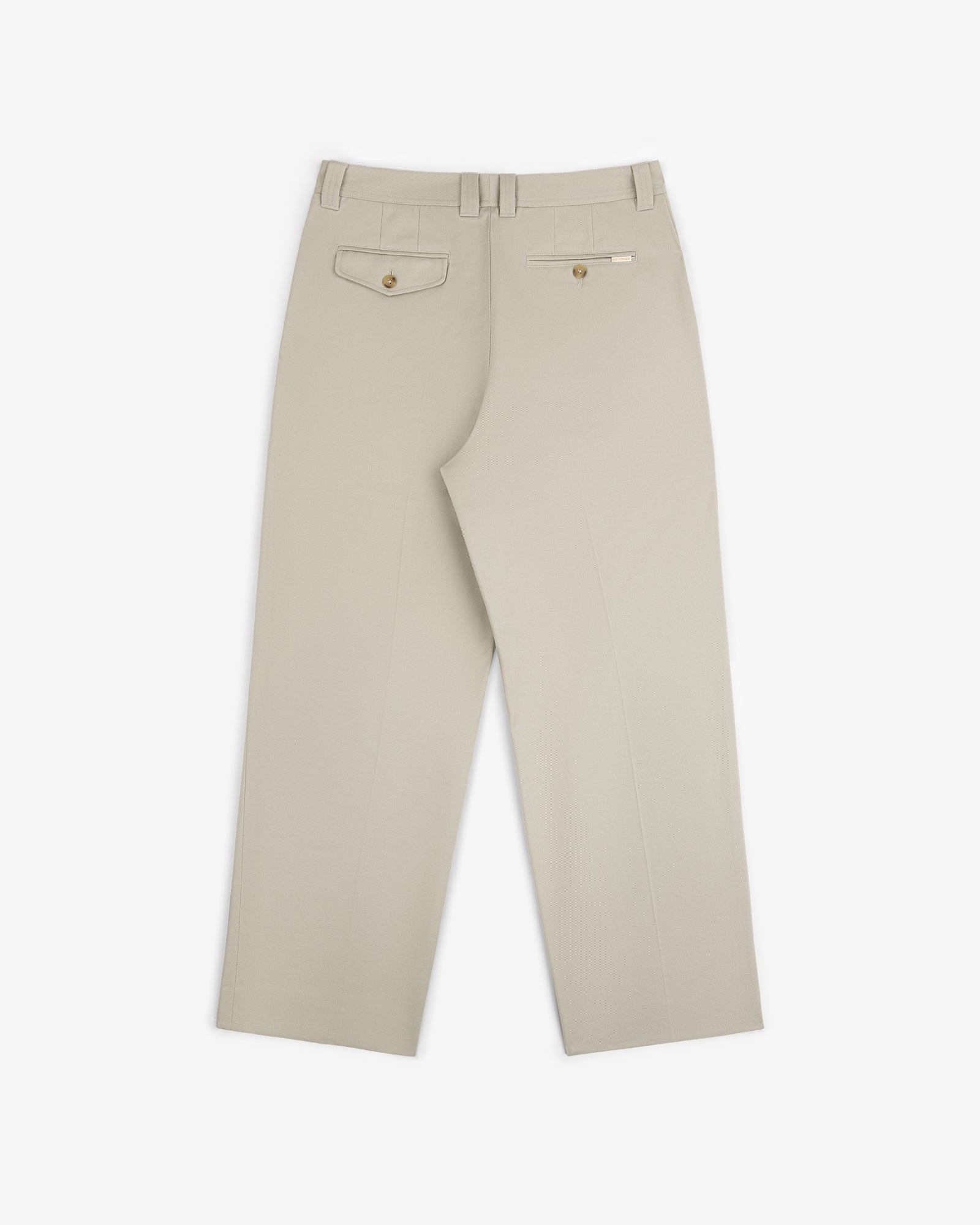 Officer Pant in beige shown from the back with two buttoned rear pockets and belt loops.