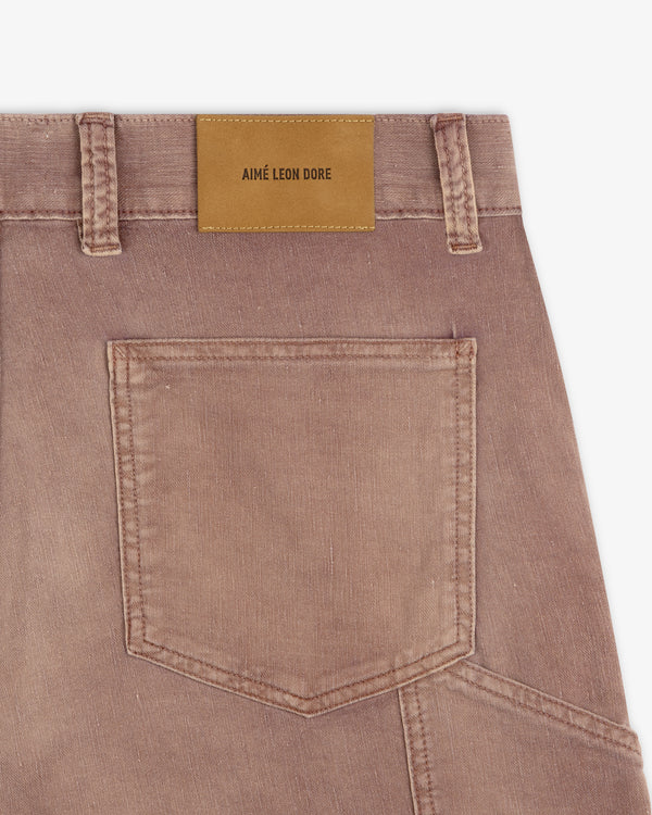 Close-up of Linen Blend Carpenter Pant’s brown back pocket with a tan leather "Aimé Leon Dore" label on the waistband.