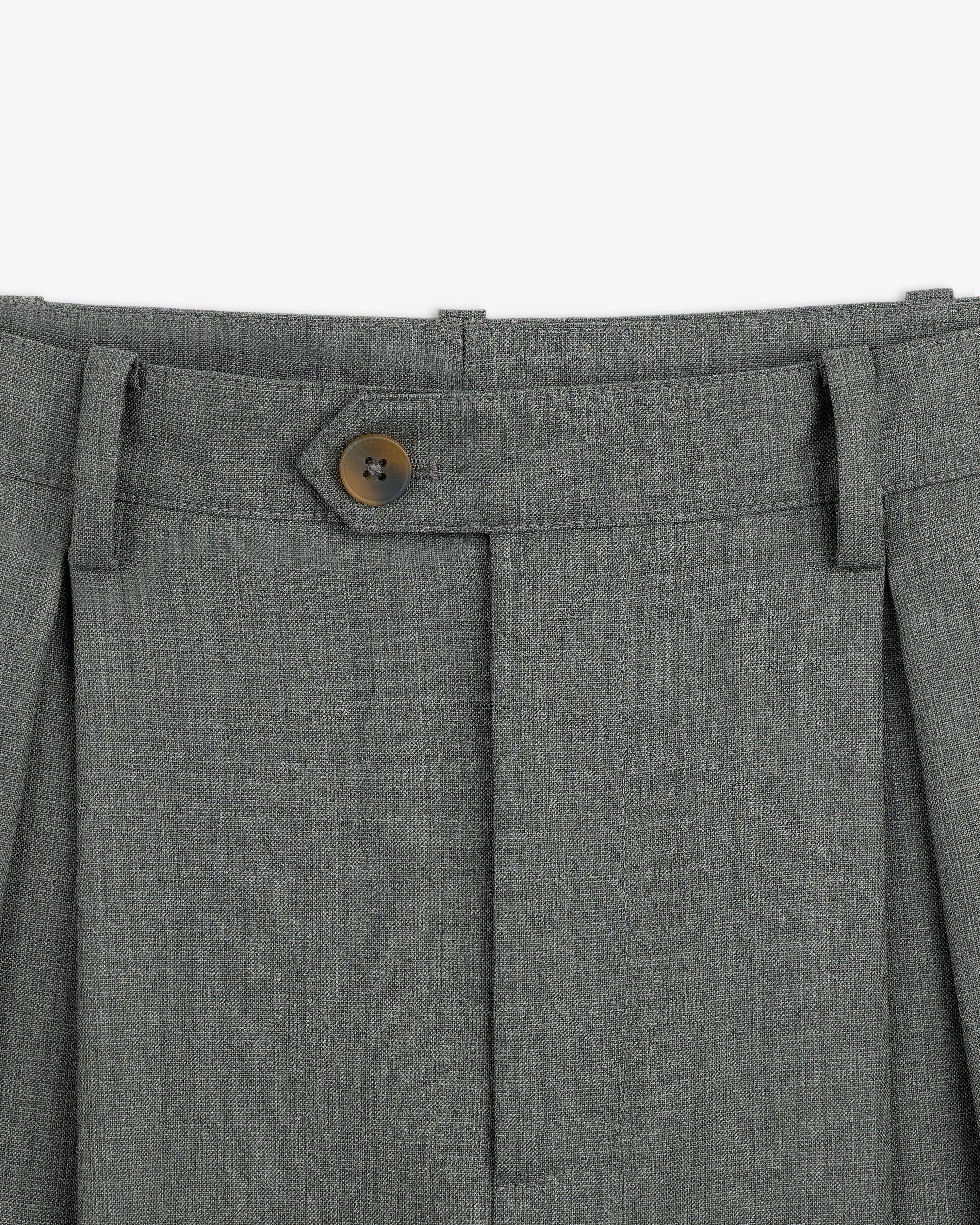 Close-up of the waistband on Lightweight Cuffed Trouser in gray, featuring a brown button and belt loops.