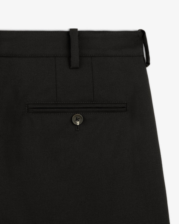 Close-up of Lightweight Cuffed Trouser in black, featuring a buttoned back pocket and belt loops.