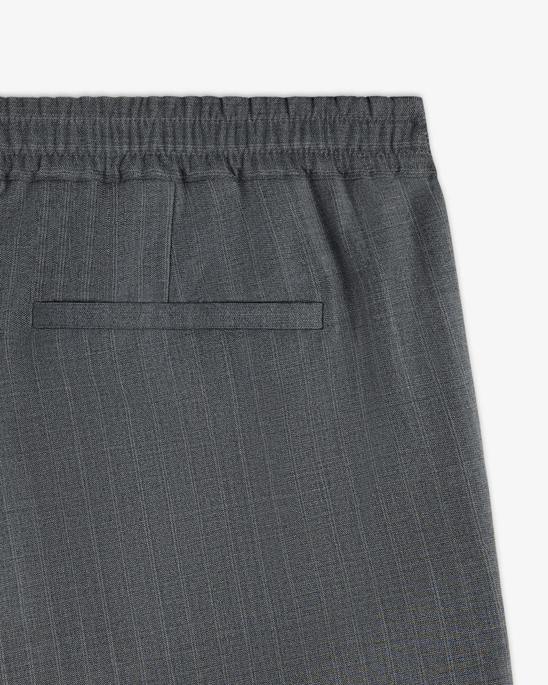 Close-up of Pinstripe Elasticated Waist Trouser in grey, featuring a single back welt pocket.