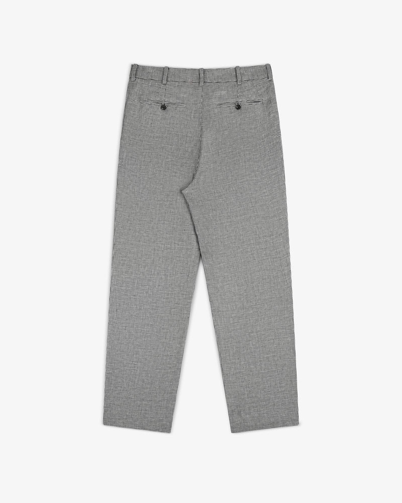 Houndstooth Pleated Trouser shown from the back with belt loops and two buttoned back pockets, laid flat on white.