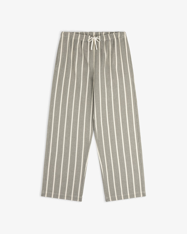 The Wide Leg Shore Pant features gray fabric with white stripes, an elastic drawstring waist, and wide legs.