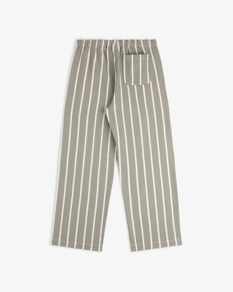 Wide Leg Shore Pant in gray with vertical white stripes, elastic waistband, and single back pocket, shown flat.