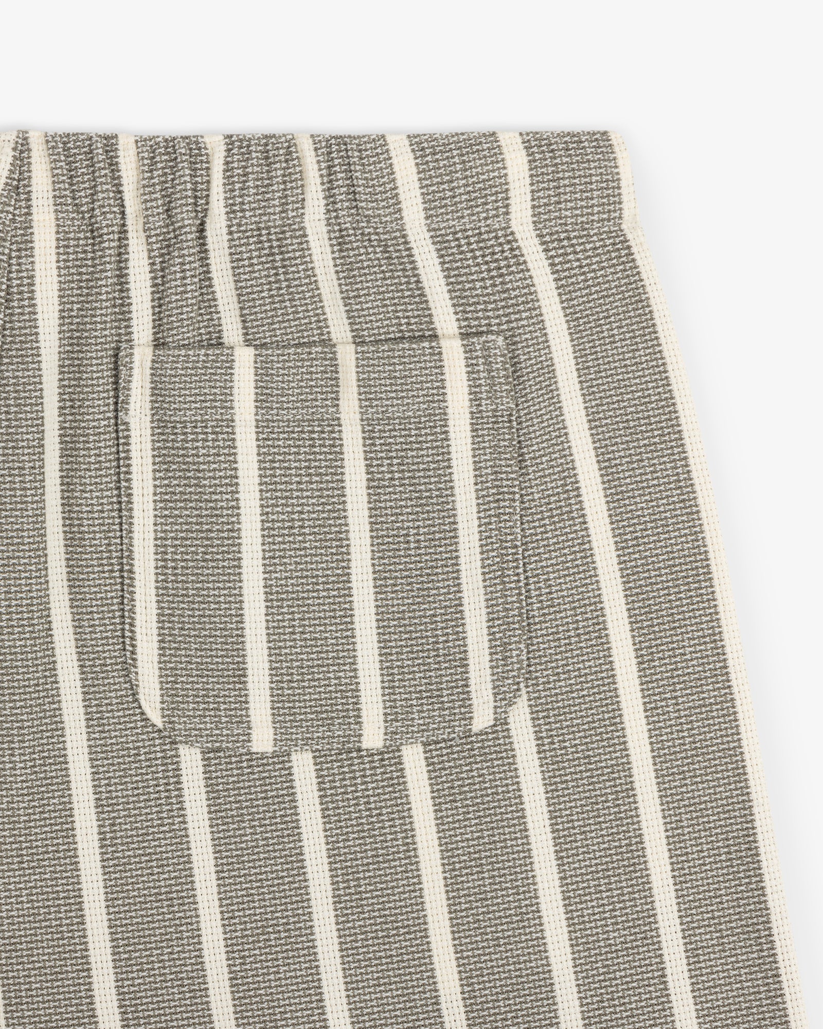 Close-up of the Wide Leg Shore Pant in gray with white vertical stripes and a small matching striped front pocket.
