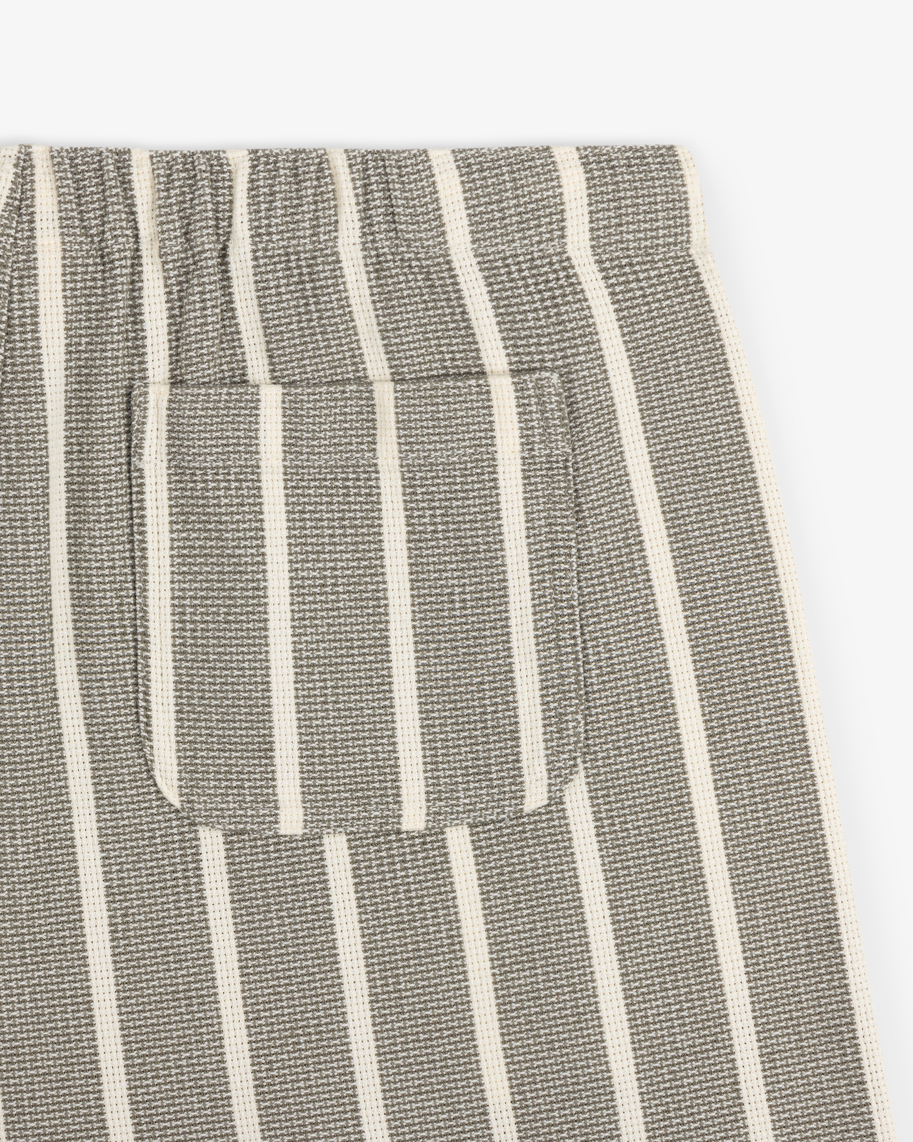 Close-up of the Wide Leg Shore Pant in gray with white vertical stripes and a small matching striped front pocket.