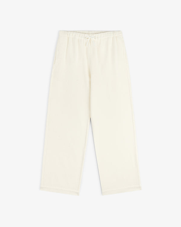 Cream Wide Leg Shore Pant with elastic waistband and side pockets, shown laid flat on a white background.