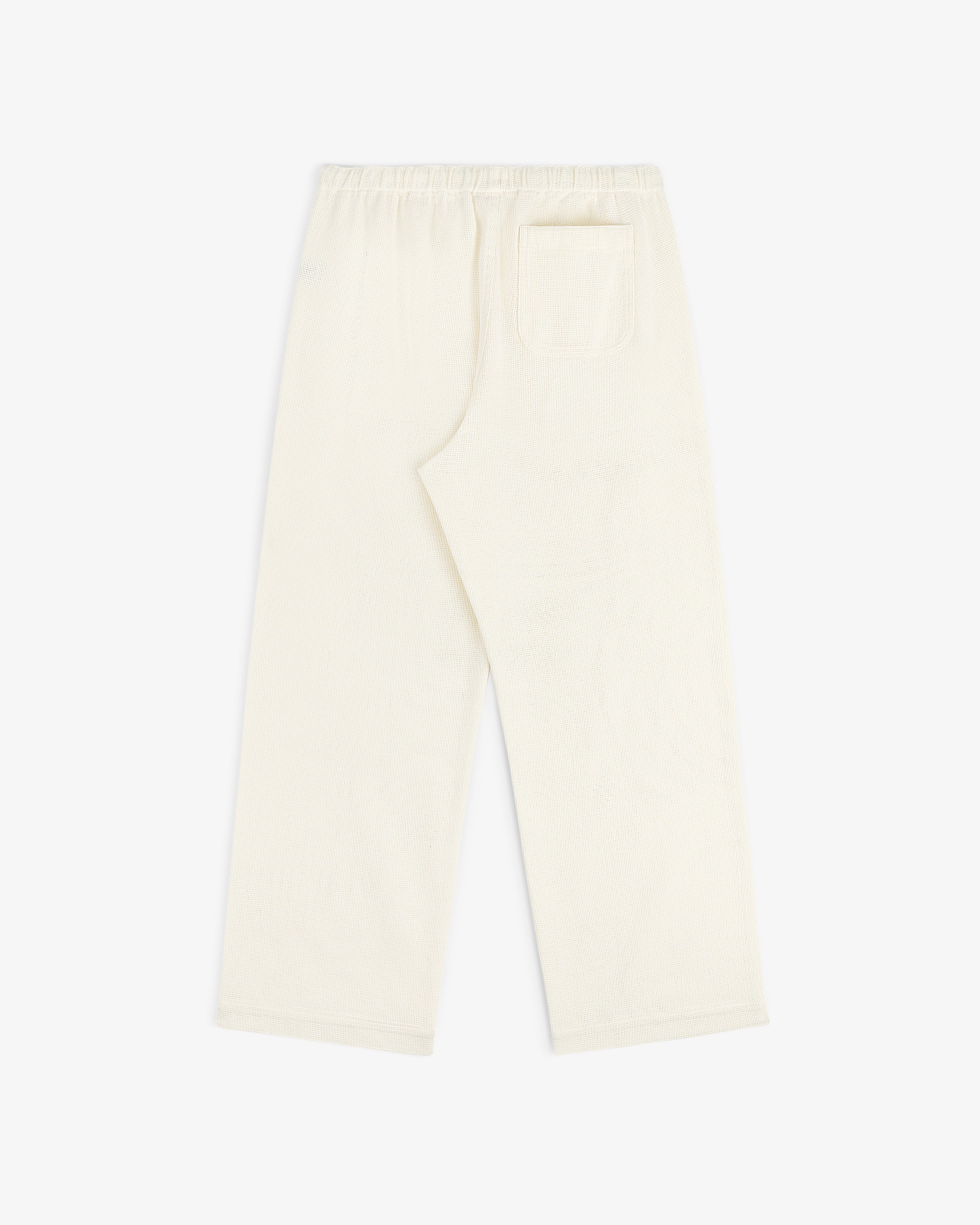 Cream-colored Wide Leg Shore Pant with an elastic waistband and back pocket, shown flat on a white background.