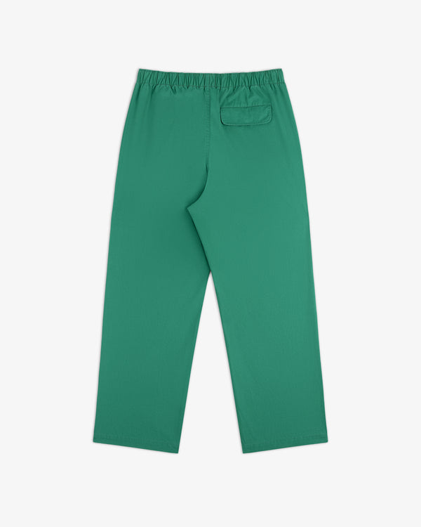 Washed Cotton Windbreaker Pant in green with an elastic waistband and a back pocket, shown flat on white background.