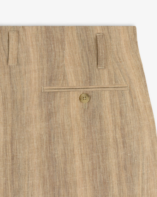 Close-up of Double Pleated Safari Suit Trouser in beige, highlighting the back pocket with button and two belt loops.