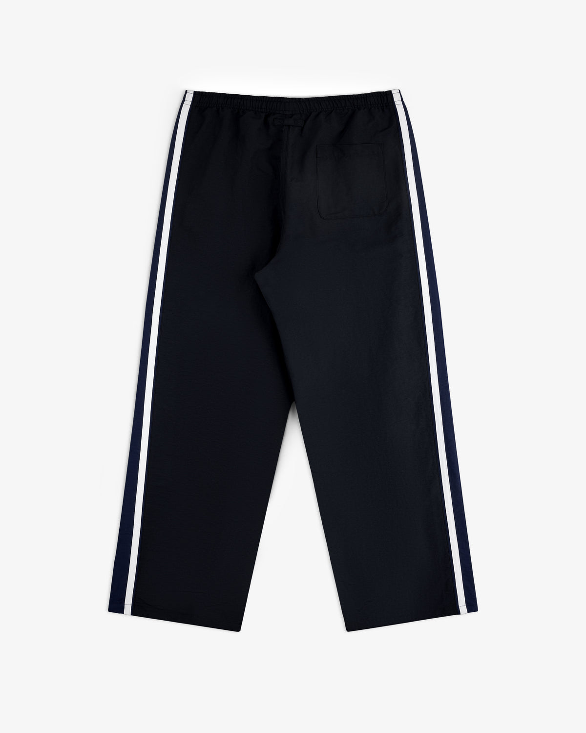 Colorblock Track Pant with white side stripes and single back pocket, flat on a white background.