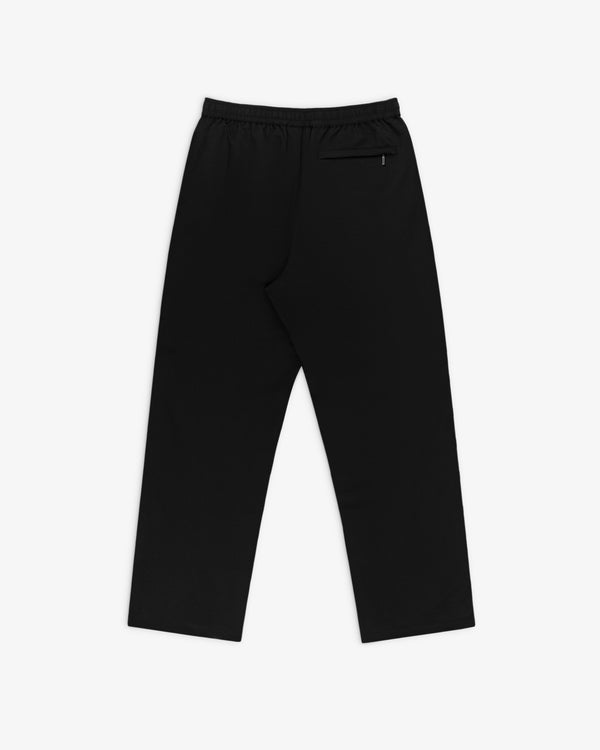 Crest Nylon Track Pant in black with straight legs, elastic waistband, and a zippered back pocket on white background.