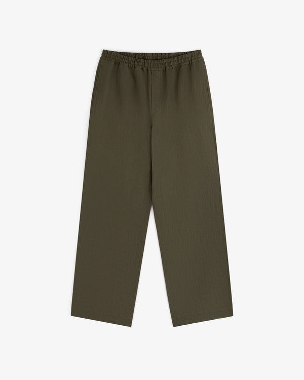 Linen Leisure Pant in olive green, wide-leg with elastic waistband, shown laid flat on a white background.