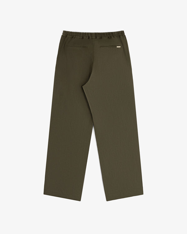 Olive green Linen Leisure Pant with elastic waistband and two back pockets, displayed on a white background.