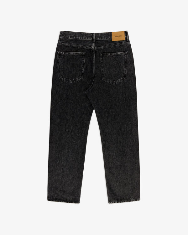 Back view of Relaxed Fit 5-Pocket Denim Pant in black with two pockets and a tan leather patch on the waistband.